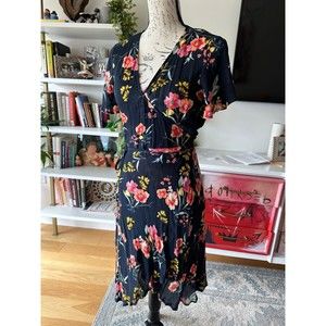 Knee length floral wrap dress
